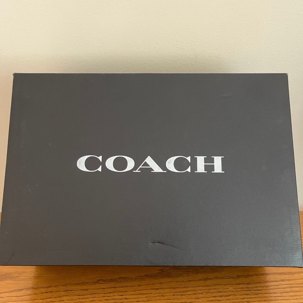 Leather coach tennis shoes ladies or men brand new never worn.